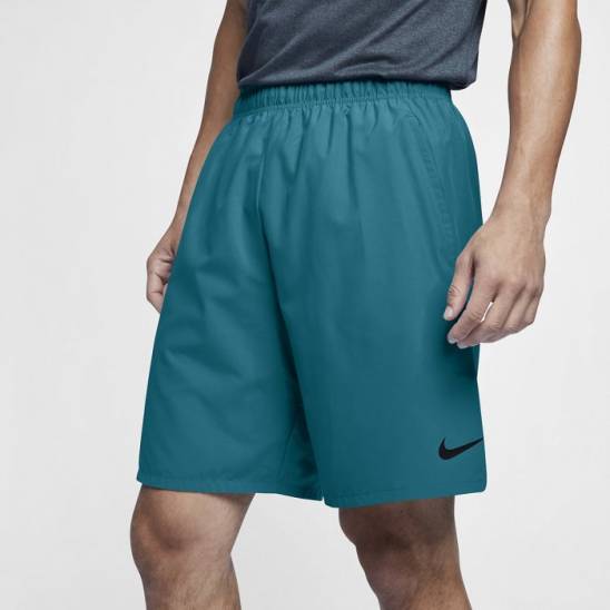 nike woven shorts turquoise