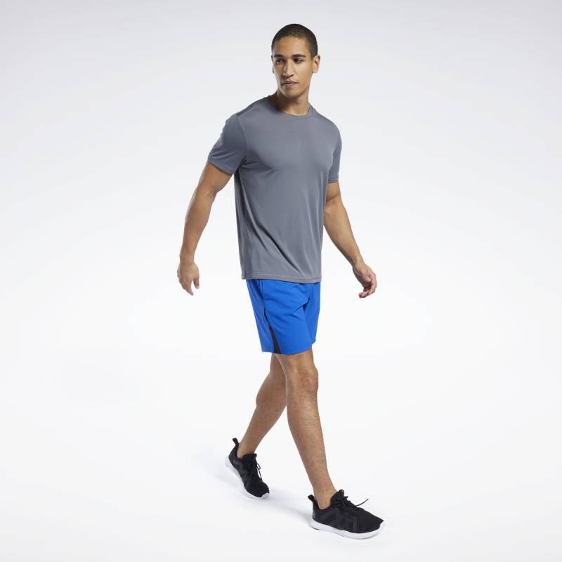 Man T-Shirt Workout WE COMM SS TECH TOP - FP9091
