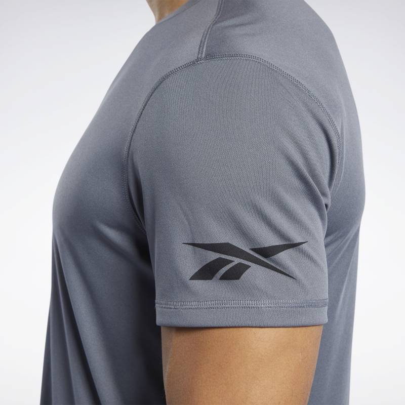 Man T-Shirt Workout WE COMM SS TECH TOP - FP9091