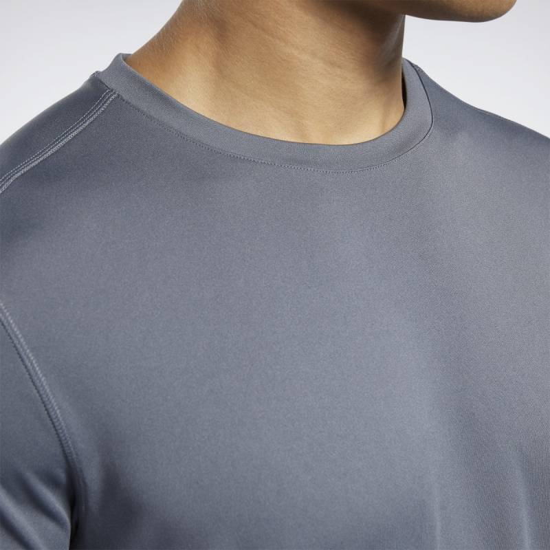 Man T-Shirt Workout WE COMM SS TECH TOP - FP9091