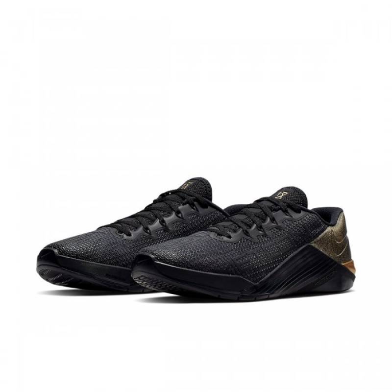 Herrenschuhe Nike Metcon 5 + schwarz-gold