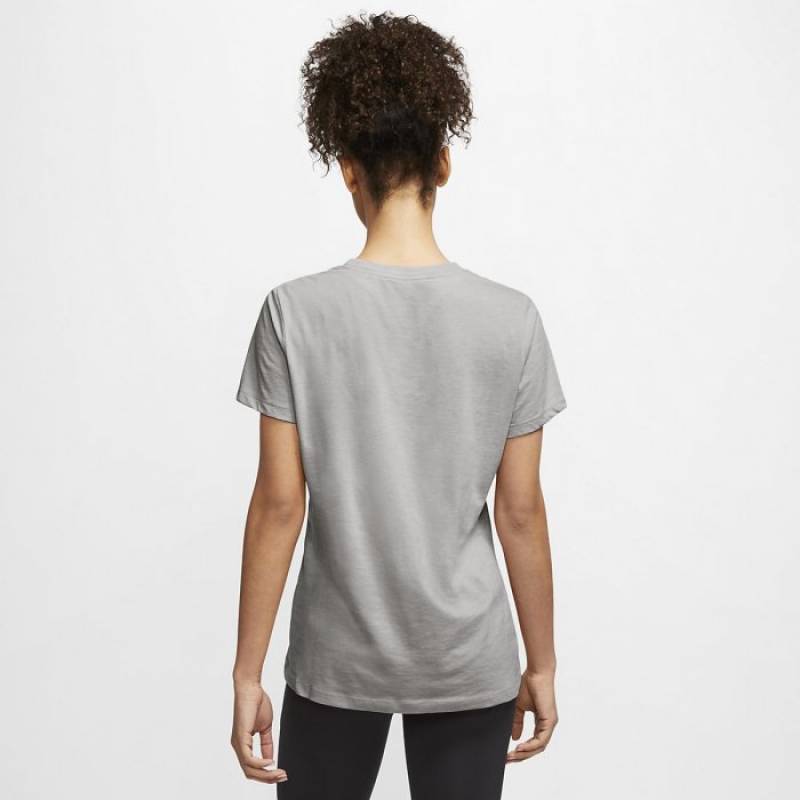 Woman training T-Shirt Nike Dri-FIT - pink swoosh