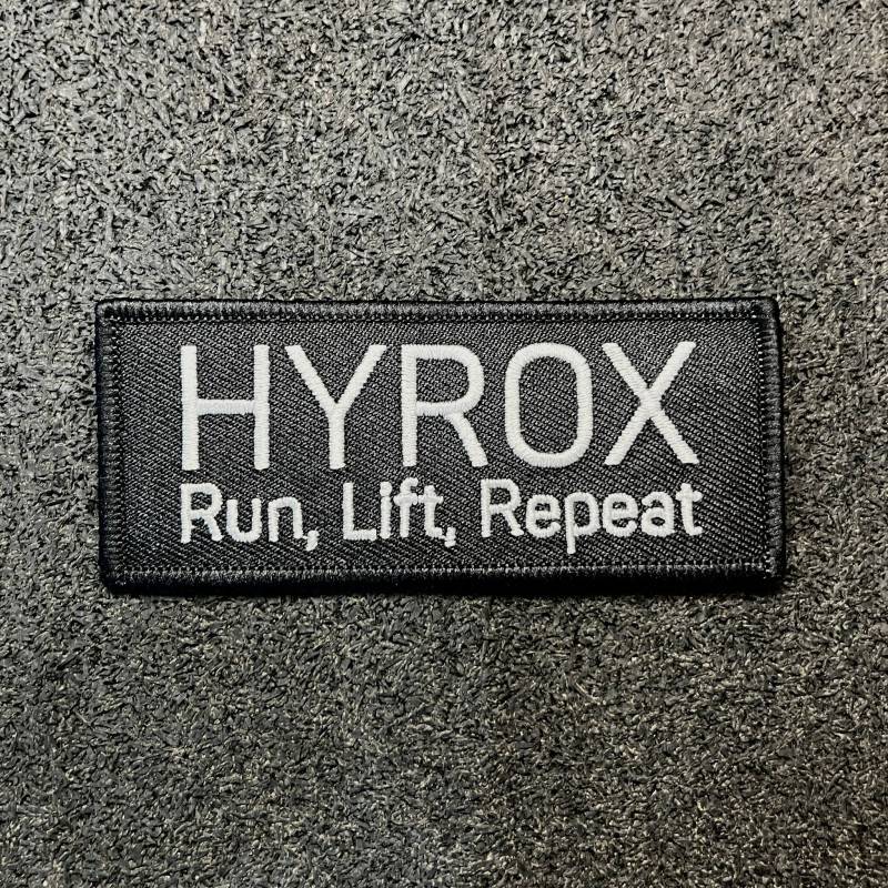 Toppa in velcro HYROX - Run, Lift, Repeat - scritta bianca